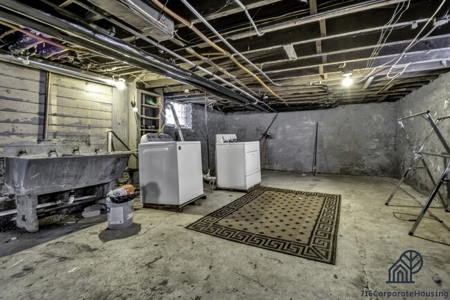 Building Photo - Furnished 2-Bedroom First-Floor Apartment Near Elmwood Village