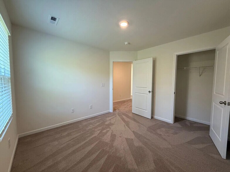 Bedroom1 entrance, closet & window - 1106 Saylors Pl