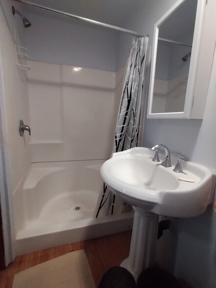 Bathroom with shower. - 26180 Whispering Oak Ln