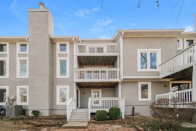 Building Photo - Shawnee Townhome with Tree Line Views and Three Levels of Living