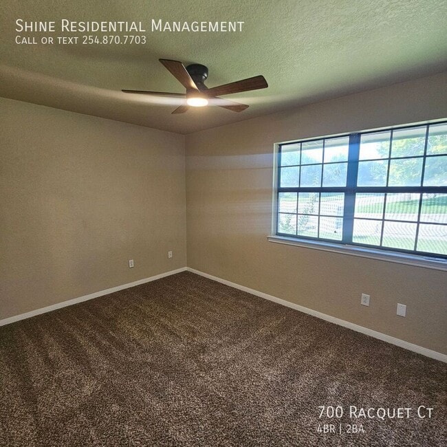 Building Photo - 700 Racquet Ct