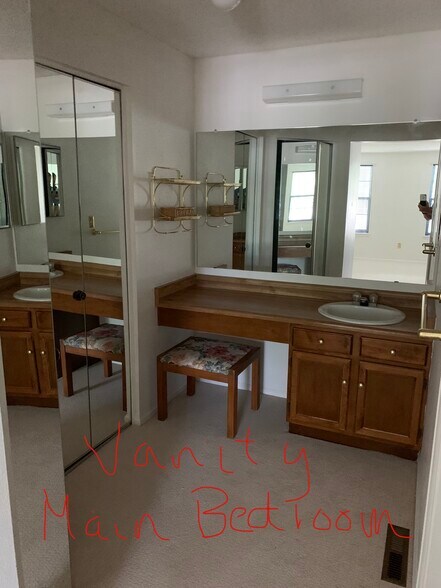 Main bedroom vanity with closets - 5341 76th W Ave