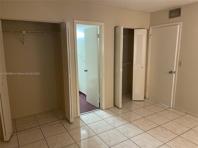Building Photo - 10818 Royal Palm Blvd