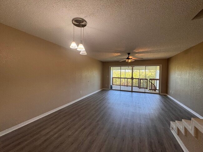 Building Photo - Coastal Luxury Awaits – 3-Story Townhome i...