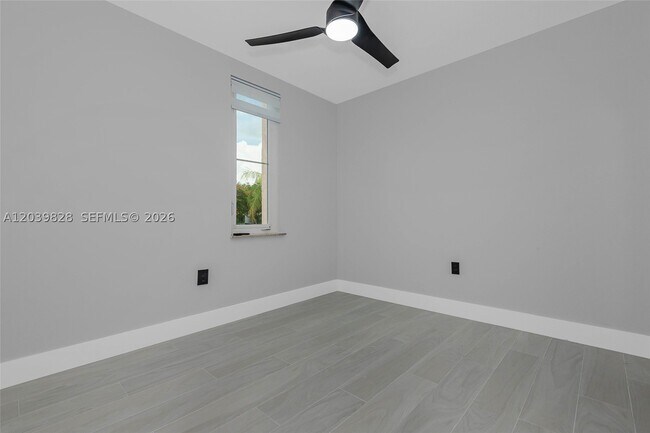 Building Photo - 6653 SW 140th Ave