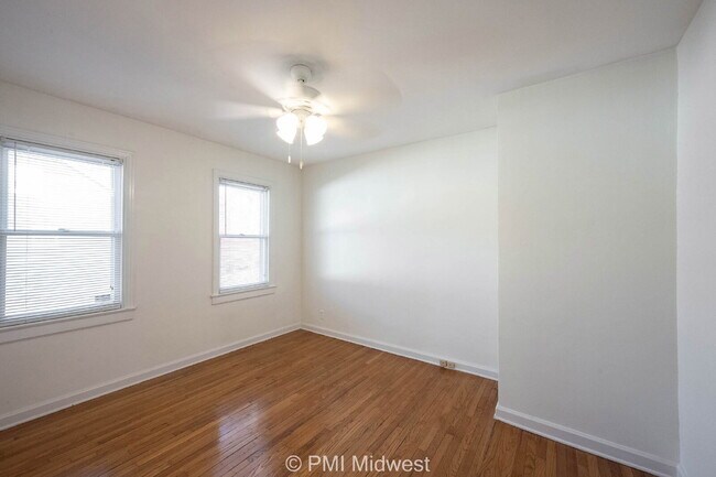 Building Photo - "Charming 2-Bedroom Duplex with Cozy Fireplace on Washington Blvd – Your Ideal Indianapolis Retre...