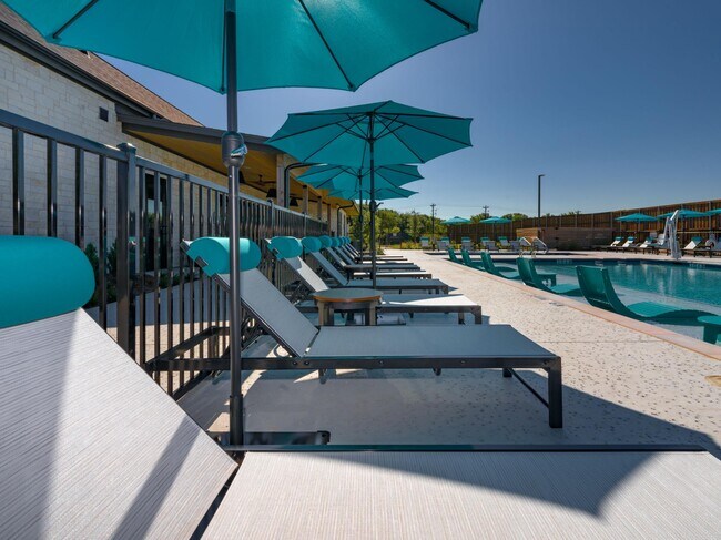 lounge chairs near resort-style pool - parcHAUS at Paloma Creek