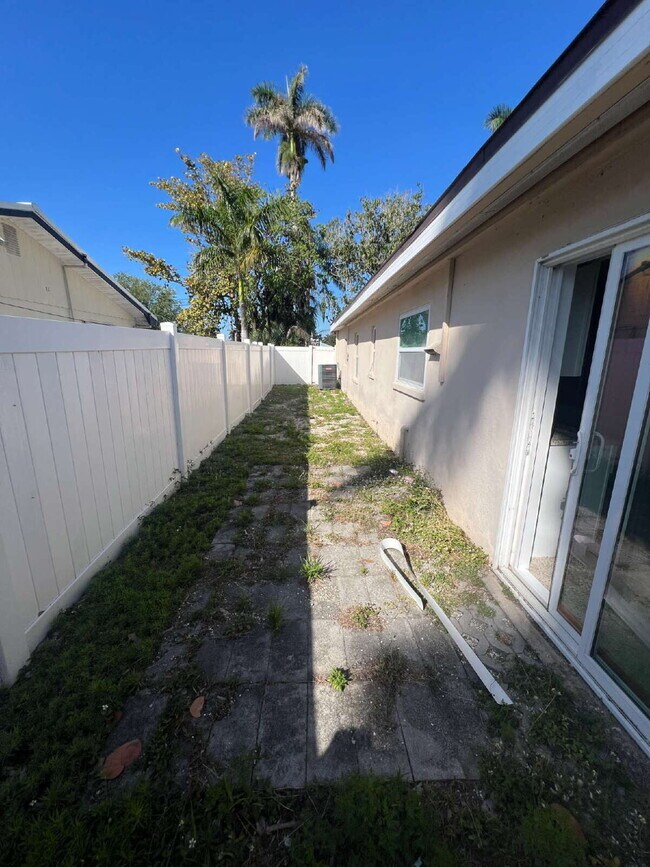 Building Photo - Charming 2-Bed Waterfront Retreat with Ter...