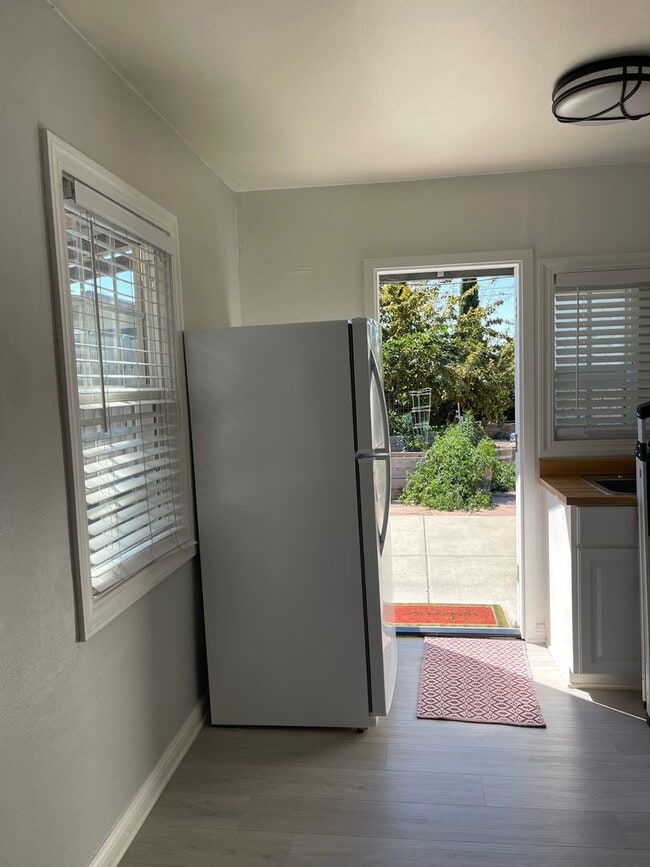 Building Photo - Cozy Home with Fully Equipped RV Space