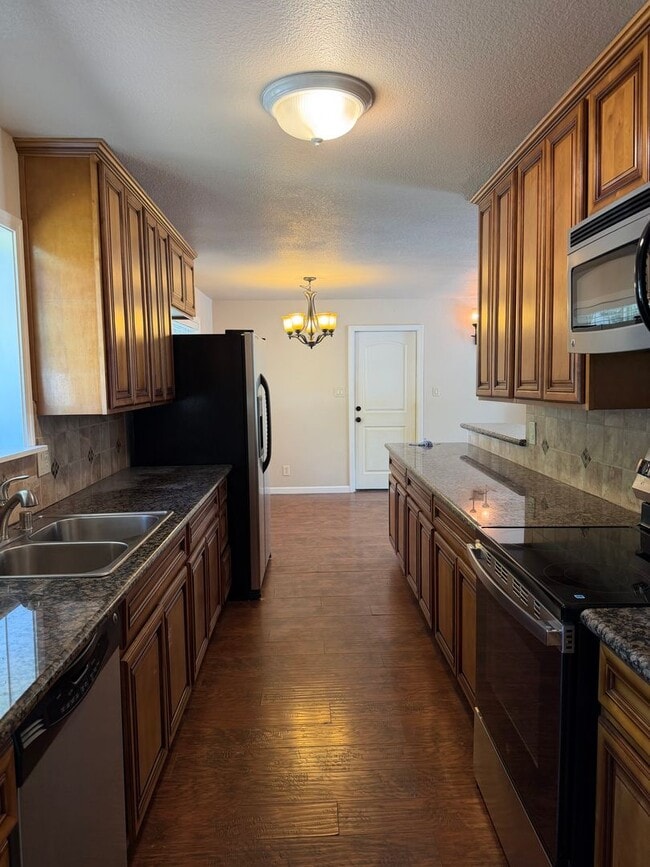 Building Photo - Beautifully Remodeled Single-Story Home with Huge Backyard & RV Access!