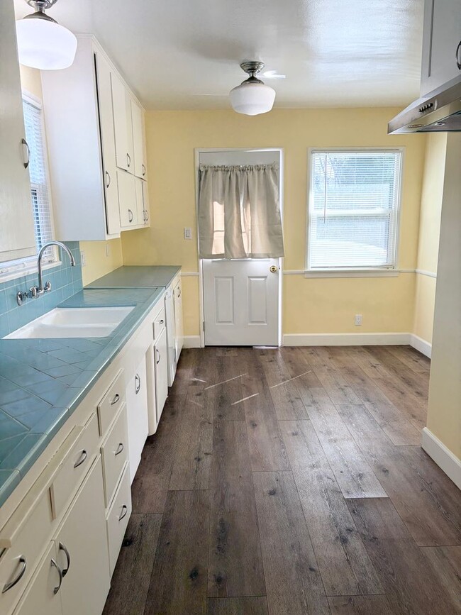 Building Photo - Spacious 3-Bedroom Home with Bonus Room, Bright Sunroom & Large Backyard