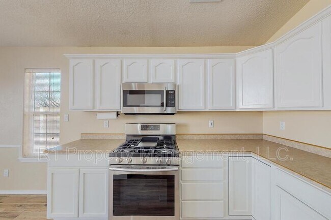 Building Photo - 5551 Rabadi Castle Ave NW