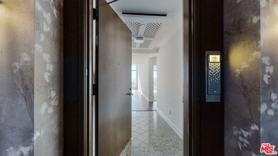 Building Photo - 900 W Olympic Blvd