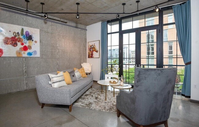 Building Photo - Rare Availability in the Streetcar Lofts, Parking, and Some Utilities Included