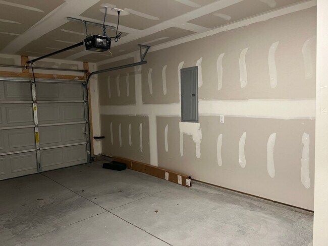 Building Photo - Beautiful New Construction 3 bedroom 2.5 Condo   with garage- Water, trash & sewer incuded!