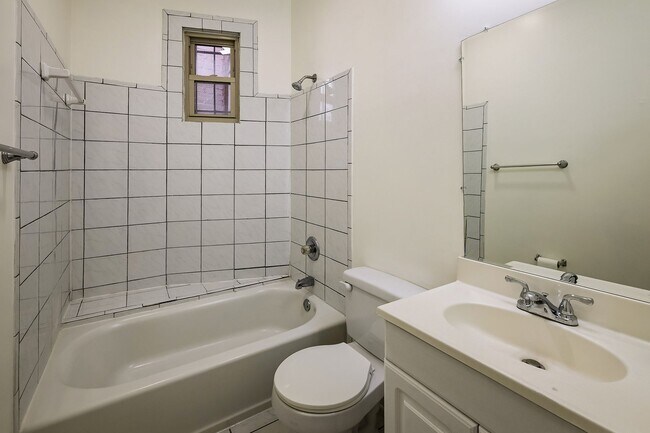 Building Photo - Historic & Charming 3BR Rowhouse near Howard is Move-in Ready!