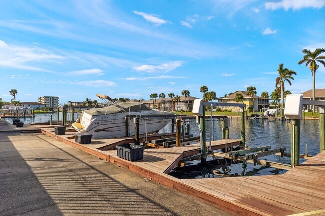 Building Photo - JK - Gulf access with dock and lift Boaters and Canal View Lover's Delight - 2 bedroom 2 bathroom...