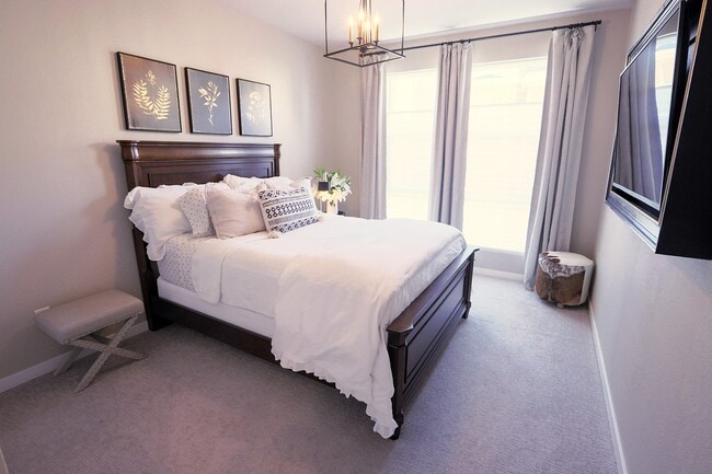 Guest bedroom #1. Easily fits a king or queen size bed. Queen bed pictured. - 15637 E Broncos Pl