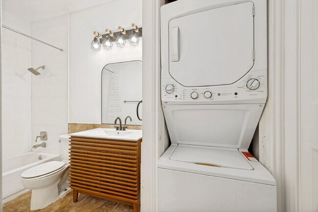 Building Photo - Spacious Dallas Condo with Unbeatable Storage, Private Patio & Carport