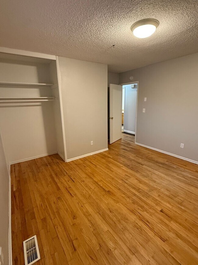 Building Photo - Charming 3 Bedroom with a Living Room, Sun Room,Huge Fenced Yard & More!