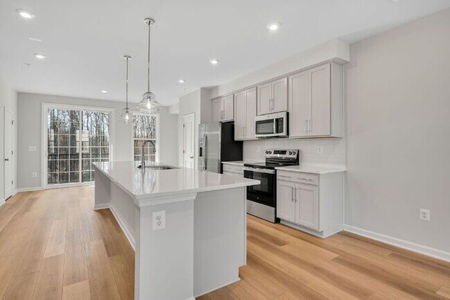 Building Photo - Brand-New 3 Bedroom Condo in Coalfield Station – $2,400/mo