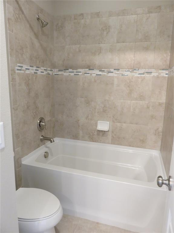 Building Photo - 8828 Tropical Palm Dr