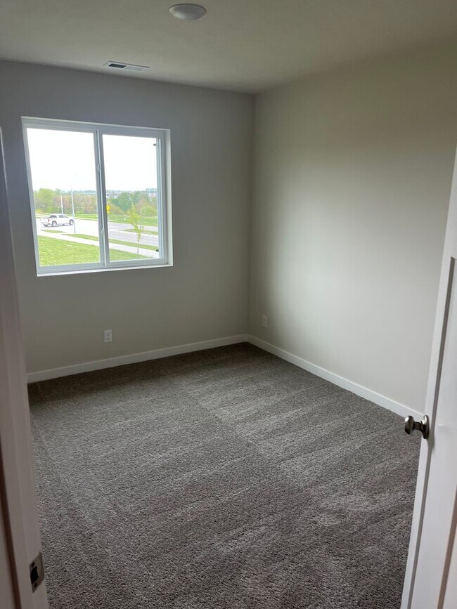 Building Photo - Spacious 5-Bedroom Duplex Near Asbury Elementary with Finished Basement & Full Amenities