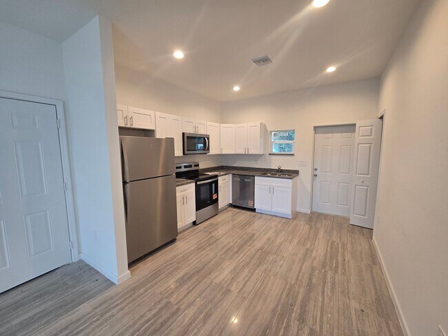 Building Photo - Brand New 2/2/1- Great SW Lehigh Acres Loc...
