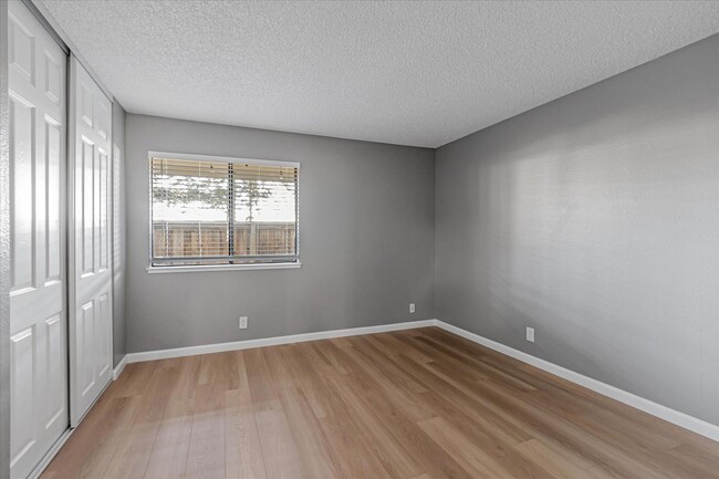 Building Photo - Stylish End-Unit Condo l Private Patio l C...