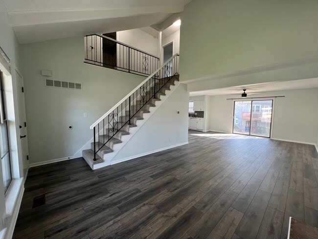 Living room/front door/stairs/dining/back door/kitchen - 14103 W 88th Terrace