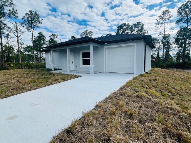 Building Photo - BRAND NEW ONE BEDROOM, ONE BATH-ONE CAR GARAGE- LEHIGH ACRES