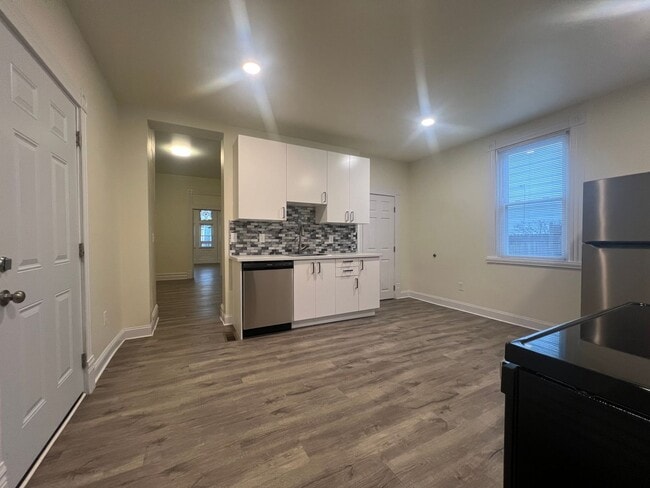 Building Photo - Updated 1BR Apartment Now Available