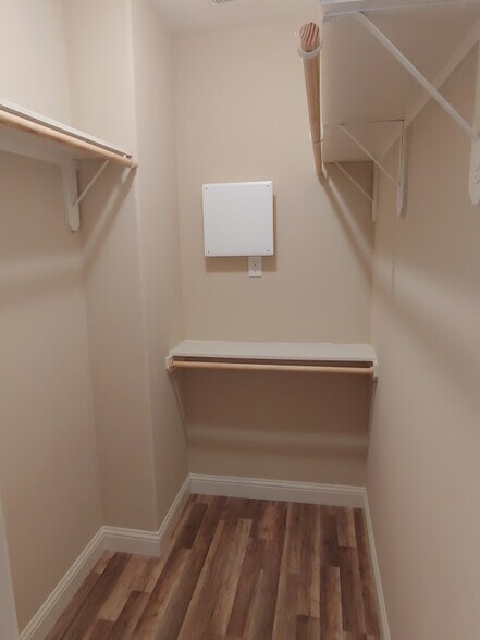 Walk-in closet with media panel - 4926 Weeping Willow Rd