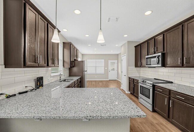 Building Photo - 719 Speckled Alder Dr