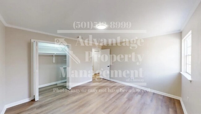 Building Photo - Showings Available!