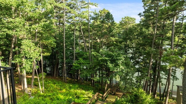 Building Photo - Serene Bella Vista Lakeside 4 bedroom