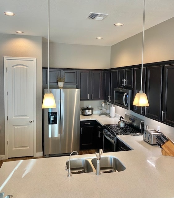 Kitchen view from DR - 5557 N Teaberry Ln