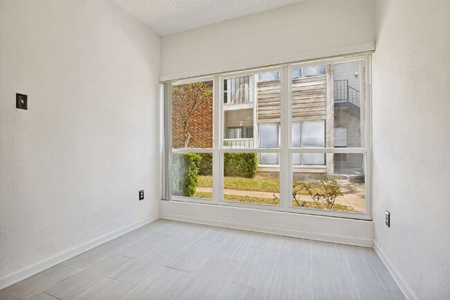 Building Photo - Spacious Dallas Condo with Unbeatable Storage, Private Patio & Carport