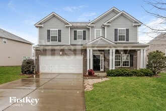 Building Photo - 6906 Barefoot Forest Dr