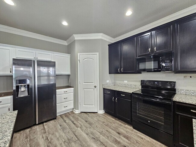 Building Photo - NEW IN MANAGEMENT - AVAILABLE NOW!