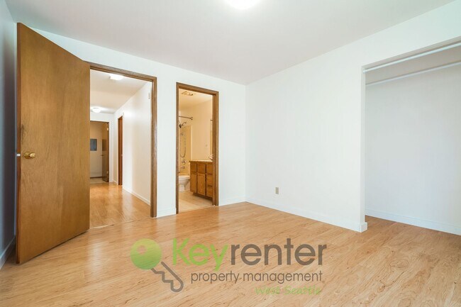 Building Photo - **Rent Special** Remodeled Two-Bedroom with Open Floor Plan, Parking, and Easy Transit Access