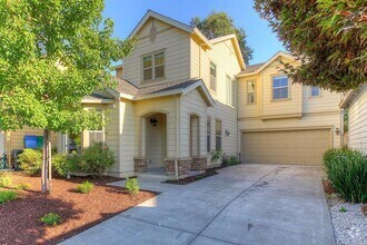 Building Photo - 1,812 Square Foot Two level 3 bedroom  2.5...