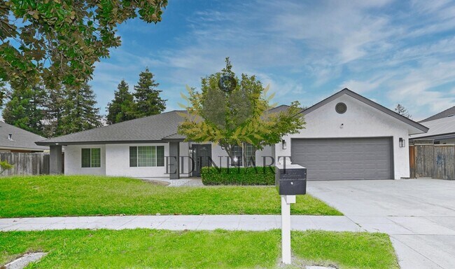 Building Photo - 7721 N Cedar Ave