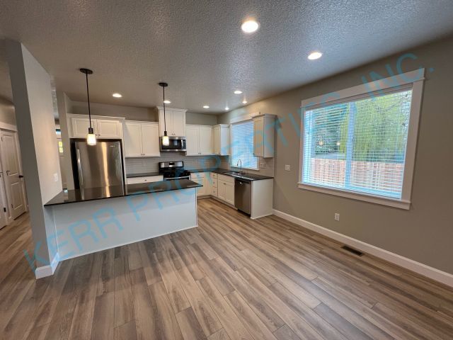 Building Photo - Charming 4-Bedroom Home with 2 Full Baths ...