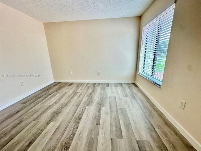 Building Photo - 10940 SW 143rd Ct