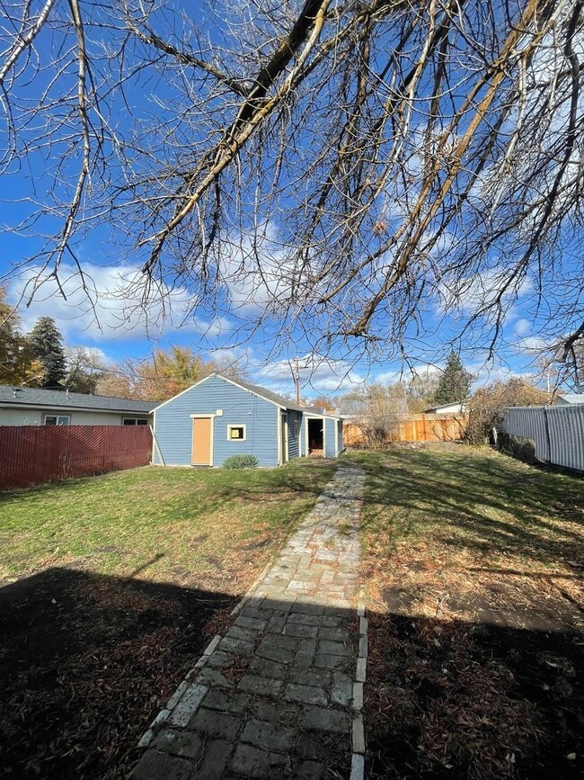 Building Photo - Available Now! Pet-Friendly Updated 2 Bedroom, 1 Bath Home with Fenced Yard & Storage Shed