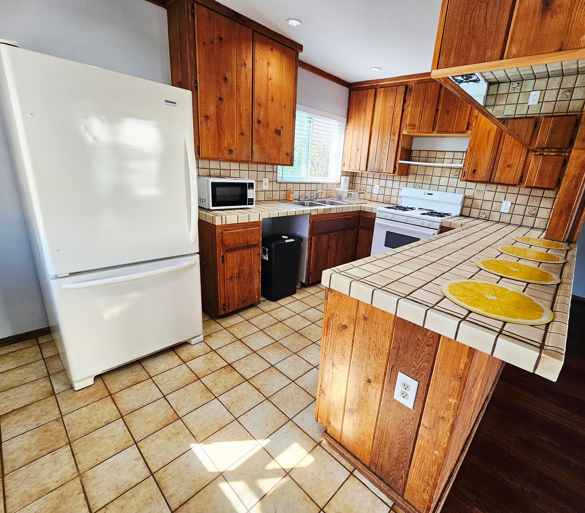 Custom woodwork cabinetry & Spanish Tile countertops & floors. - 934 S Myers St