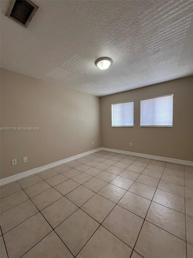 Building Photo - 5694 W 25th Ct