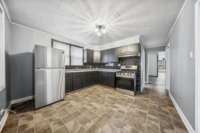 Building Photo - 3134 W 39th Pl