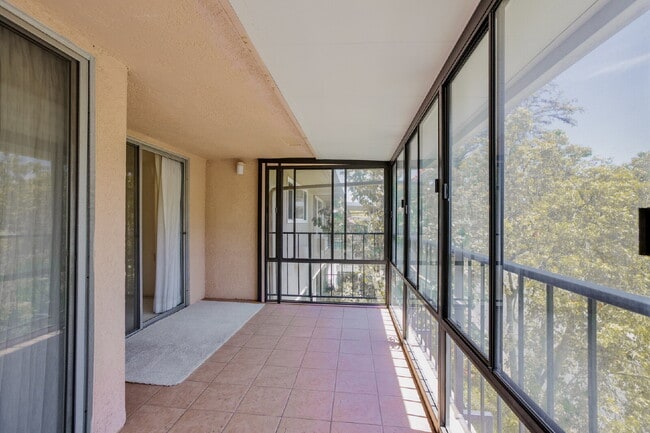 Building Photo - Spacious 3BD/3BA Condo with Enclosed Patio and Resort-style Amenities